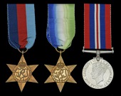 Three: Able Seaman J. F. I. Lawrence, Royal Navy, who was killed in action when H.M.S. Veteran, on convoy duty in...