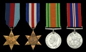 Four: Lieutenant D. F. M. Sexton, Royal Naval Volunteer Reserve, who was killed in action in Landing Craft L-256...