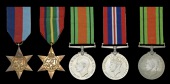 Family Group:
Four: Private A. S. Mace, East Surrey Regiment, who was killed in action in Malaya, 5 February...