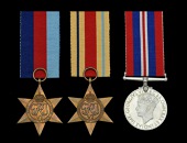 Three: Gunner L. N. Goldsmith, Royal Artillery, who was taken Prisoner of War in North Africa, and was killed when,...