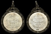 ANGUS, Dundee, Dundee High School, an engraved silver award medal by J. Law, named (To George Ogilvie, Dux, Highest...