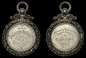 INVERNESS-SHIRE, Dulnain Bridge, an engraved silver award medal, engraved (Dulnain Bridge School, for Excellence),...
