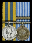 Pair: Gunner M. O’Neill, Royal Artillery, who served as a Forward Observer with 70 Field Battery, 45 Field...