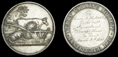 Kerry Farming Society, a silver award medal by T.W. Ingram, bull, sheep, bale of hay, plough and spade, house and...