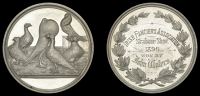 Irish [Pigeon] Fanciers’ Association, a silver award medal by J. Carter, six pigeons, rev. wreath, named (Strabane...
