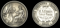Wexford Amateur Photo[graphi]c Exhib[itio]n, 1896, a silver award medal by J.A. Restall, robed female seated left in...