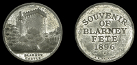 BLARNEY Fete, 1896, a white metal medal by J.F. O’Crowley, view of Blarney Castle rising above trees, rev. legend,...