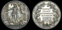England, Crystal Palace International Exhibition, 1881, a silver award medal by J. Pinches, Britannia holding...