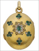 Sarah Bernhardt interest: A French emerald and diamond set oval locket pendant, the oval hinged locket in bloomed...