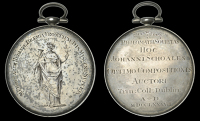 Trinity College, Dublin, Philomathic Society, an engraved silver award medal, unsigned, standing robed female...