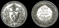 Irish Cyclists’ Association Championship, a silver award medal by Gibson & Co, hand of Ulster on shield, winged...