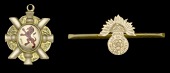 Royal Fusiliers Pin Bar Brooch and ‘S.D.C.I.B.L 1st Div. 1907 W.D.’ Fob.
In 9 carat gold, the first of cap...