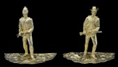Soldier Figures.
Two superbly wrought items in unmarked silver-gilt coloured metal, each standing on a half circle...
