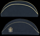 The Essex Regiment Two Officers’ Torrin Style Side Hats.
Both in navy blue cloth and edged with gold orris cord,...