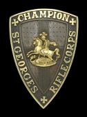 St. George’s Rifle Corps Champion’s Sleeve Badge.
A very fine quality example in die-cast bronze with gold...
