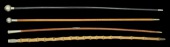 Swagger Sticks.
Four examples in a variety of woods with white metal tops, two globular, Bedfordshire and...