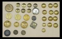 Miscellaneous Buttons.
A card display including an early French Republic bone back coatee, tunics 57th & 77th, Life...