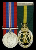 Pair: Lieutenant W. R. de la C. Shirley, Nigeria Regiment, who played First Class Cricket for Cambridge University...