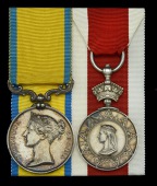 Pair: Captain’s Steward Justin Sergercet, Royal Navy, who was a member of the R.N. Rocket Brigade as Steward to...