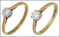 Two diamond single stone rings, each set with a brilliant-cut diamond, first with maker’s mark ‘JH’ and...