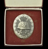 A German Second War Wound Badge in Silver.
A good solid construction Wound Badge in silver, cased, maker...