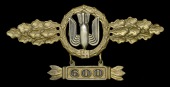 A German Second War Luftwaffe Bomber Clasp in Gold with Pendant.
A rare numbered pendant example, excellent gold...