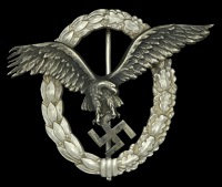 A German Second War Luftwaffe Pilots Badge.
The rare variant being the thin wreath example of the Luftwaffe Pilots...