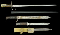 A Group of Bayonets.
A French 1879 Gras bayonet, excellent blade with nice engraving along the flat back edge,...