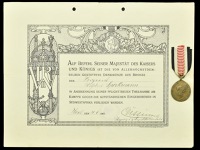 An Imperial German South West Africa Campaign Medal and Citation.
A good condition award with its red, white and...