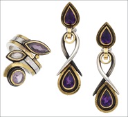 A silver and amethyst ring and earrings by Barbara Bertagnolli, the earrings with reverse-set pear-cut amethyst...