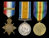 Three: Captain and Adjutant R. E. Drake, 1st Battalion, Lincolnshire Regiment, who was mortally wounded during a...