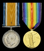 Pair: Private J. T. Gresswell, 1st Battalion, Northumberland Fusiliers, who was captured and taken Prisoner of War...