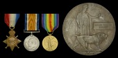 Three: Private S. T. Collett, 1/4th Battalion, Oxfordshire and Buckinghamshire Light Infantry, who was killed in...