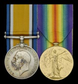 Pair: Second Lieutenant A. Tapping, Royal Flying Corps and Royal Air Force, who served as a Handley Page O/400 pilot...