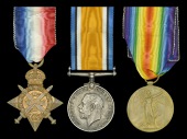 Three: Lance-Corporal H. V. Steedman, 1st Battalion, Scots Guards, who was killed in action when his battalion was...