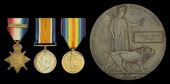 Three: Lance-Corporal W. H. Weekes, 1st Battalion, Devonshire Regiment, who was killed in action on the Western...
