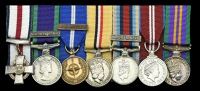 The mounted group of nine miniature dress medals worn by Colour Sergeant D. Cutterham, C.G.C., 1st Battalion, The...