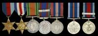 Six: Pilot Officer H. Baker, Royal Canadian Air Force, who flew in at least 33 operational sorties as a Halifax...