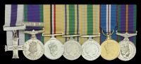 The mounted group of seven miniature dress medals worn by Corporal A. W. Currie, M.C., 1st Battalion, King’s Own...