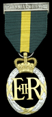 Efficiency Decoration, E.II.R., Territorial, reverse officially dated 1955, with integral top riband bar, in Royal...