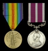 Pair: Acting Sergeant H. A. Long, Oxfordshire and Buckinghamshire Light Infantry, who was awarded the Meritorious...