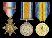 Three: Private W. C. Wilby, Oxfordshire and Buckinghamshire Light Infantry, who was killed in action on the Western...