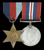 Pair: Private R. C. Johnson, Oxfordshire and Buckinghamshire Light Infantry, who was taken Prisoner of War during...