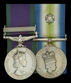 Pair: Craftsman A. Shaw, Royal Electrical and Mechanical Engineers, late Royal Marines, who was killed in action...