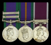 Three: Warrant Officer Class 2 L. J. Poultney, Royal Electrical and Mechanical Engineers, later commissioned...
