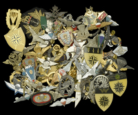 A Selection of Parachute Forces Insignia.
Including cap badges for Canadian Parachute Regiment, Parachute insignia...