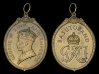 Badge of the Certificate of Honour, for Basutoland, G.VI.R., 1st type, ‘George VI King and Emperor’, large oval...