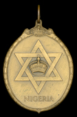 Badge of the Certificate of Honour, for Nigeria, G.V.R., small bust, large oval bronze neck badge, 68mm x 50mm, good...