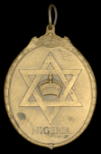 Badge of the Certificate of Honour, for Nigeria, G.V.R., large bust, large oval bronze neck badge, 68mm x 50mm, good...
