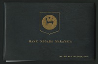 Bank Negara Malaysia, a leather presentation album with presented to TAN SRI W. H. Wilcock P.M.N, containing a set...